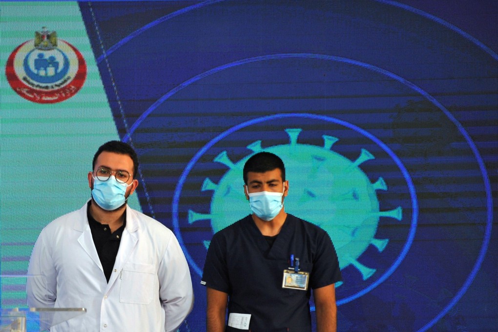 Dr Abdel Menoim Selim and nurse Ahmed Hamdan Zayed, the first two Egyptians to receive China’s Sinopharm Covid-19 vaccine, at Abou Khalifa hospital in Ismailia, Egypt on Sunday. Photo: Reuters