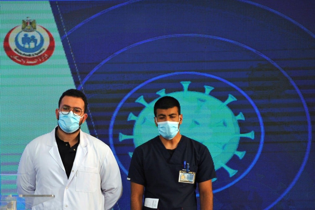 Dr Abdel Menoim Selim and nurse Ahmed Hamdan Zayed, the first two Egyptians to receive China’s Sinopharm Covid-19 vaccine, at Abou Khalifa hospital in Ismailia, Egypt on Sunday. Photo: Reuters