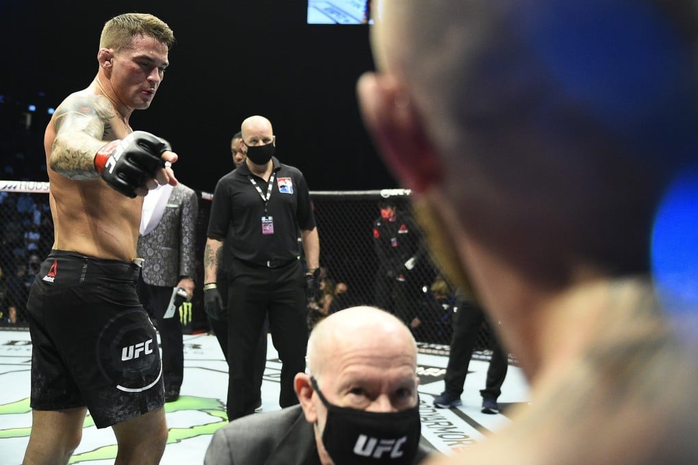 Dustin Poirier gestures to Conor McGregor after his victory in their lightweight fight at UFC 257 in Abu Dhabi. Photo: Chris Unger/Zuffa LLC