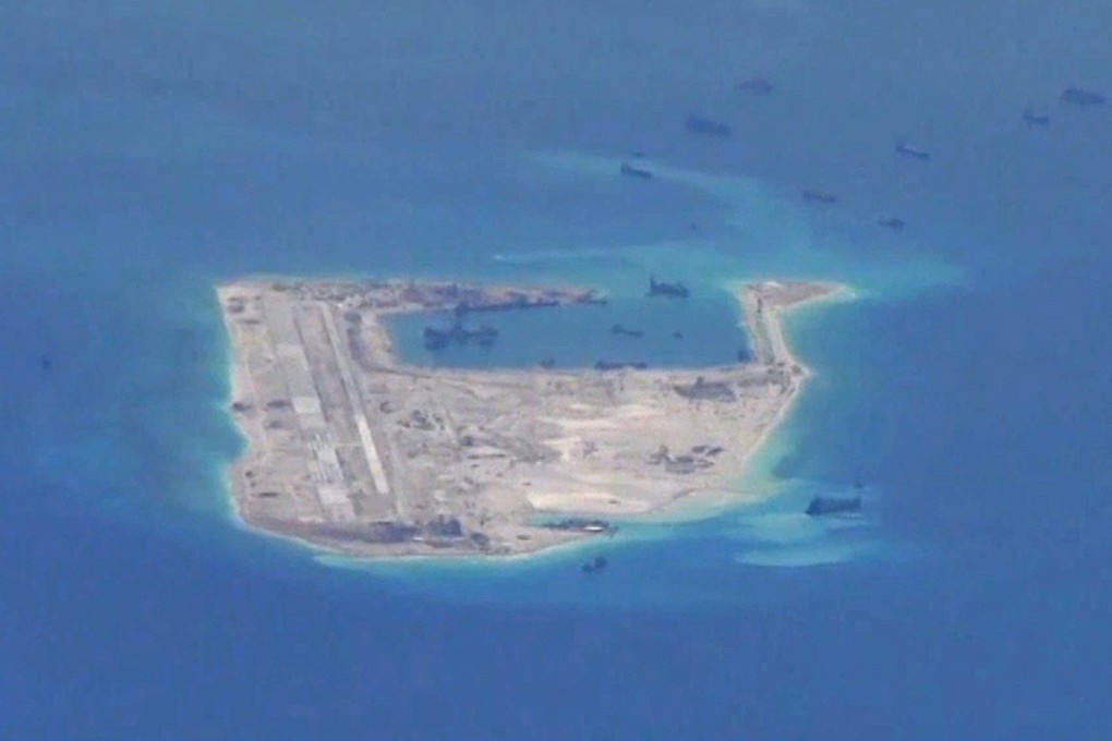 The PLA is kitting its personnel on Fiery Cross Reef with uniforms better suited to a warmer climate. The station is in the disputed Spratly Islands in the South China Sea. Photo: US Navy/Handout via Reuters