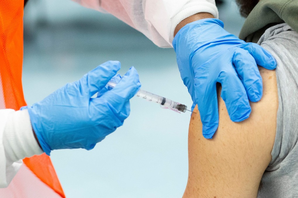 A man receives a dose of the Moderna Covid-19 vaccine in New York on January 10. Photo: AFP
