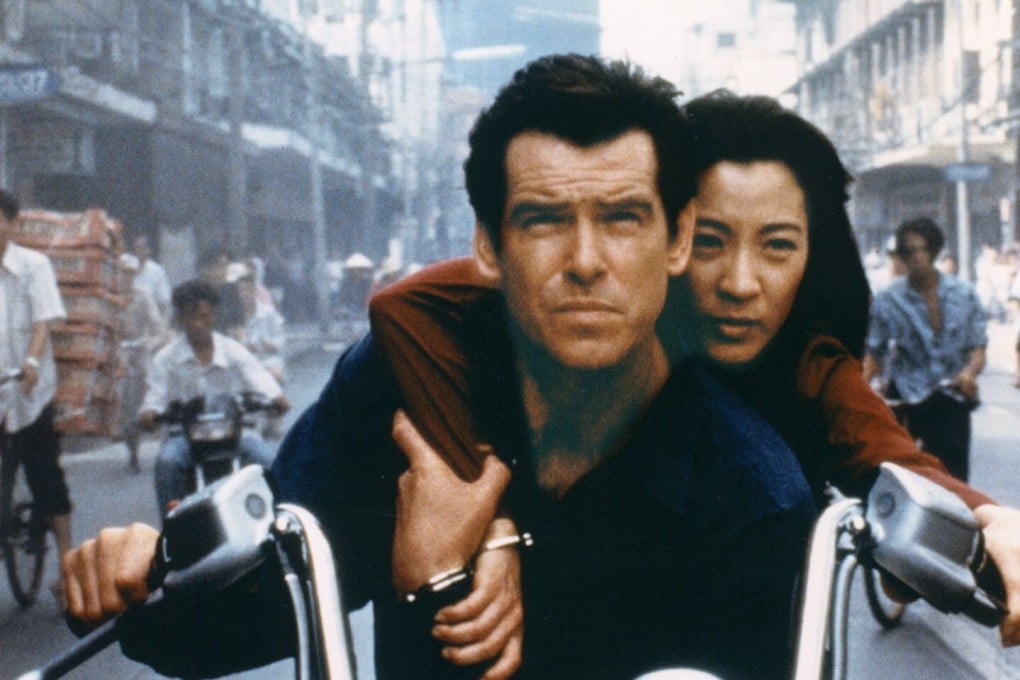Pierce Brosnan and Michelle Yeoh in a still from Tomorrow Never Dies, one of a number of James Bond films that took the spy to Asia. Photo: AP