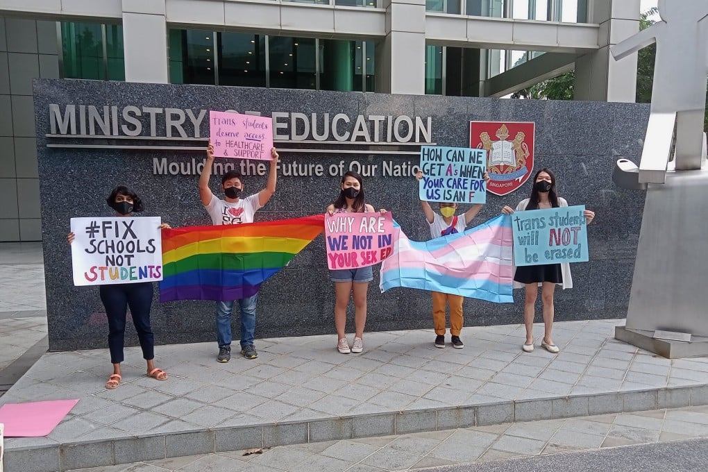 Singapore police have arrested three people for staging a brief peaceful protest against transphobia. Photo: Kirsten Han/@kixes