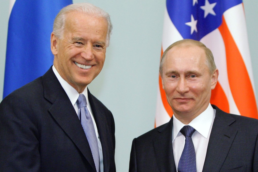 Russian leader Vladimir Putin (right) shakes hands with then US Vice-President Joe Biden during their meeting in Moscow in March 2011. Photo: AFP