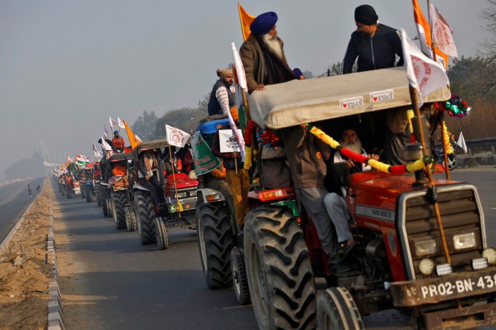 Farmers take part in a tractor rally in New Delhi to protest against new farm laws. Photo: Reuters