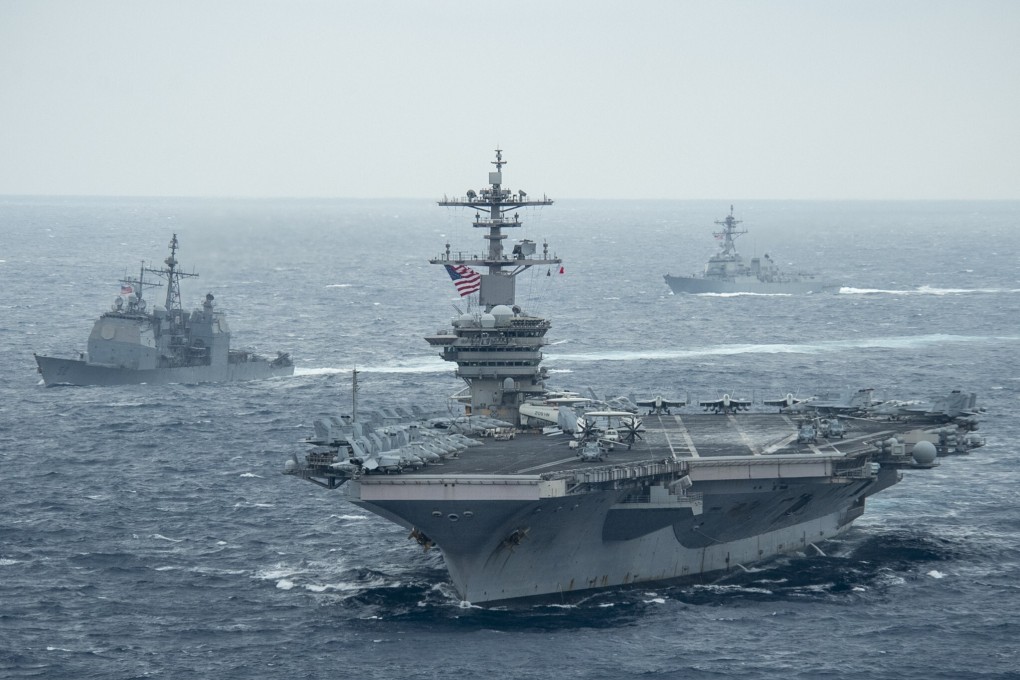 The USS Theodore Roosevelt leads the USS Bunker Hill (left) and USS John Finn across the Pacific this month. Photo: USS Theodore Roosevelt