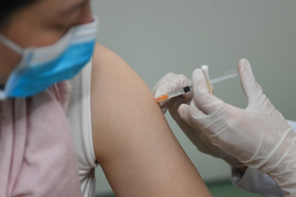 A health worker receives a Covid-19 vaccine at a community health centre in Nanjing in the eastern Chinese province of Jiangsu. Photo: Xinhua