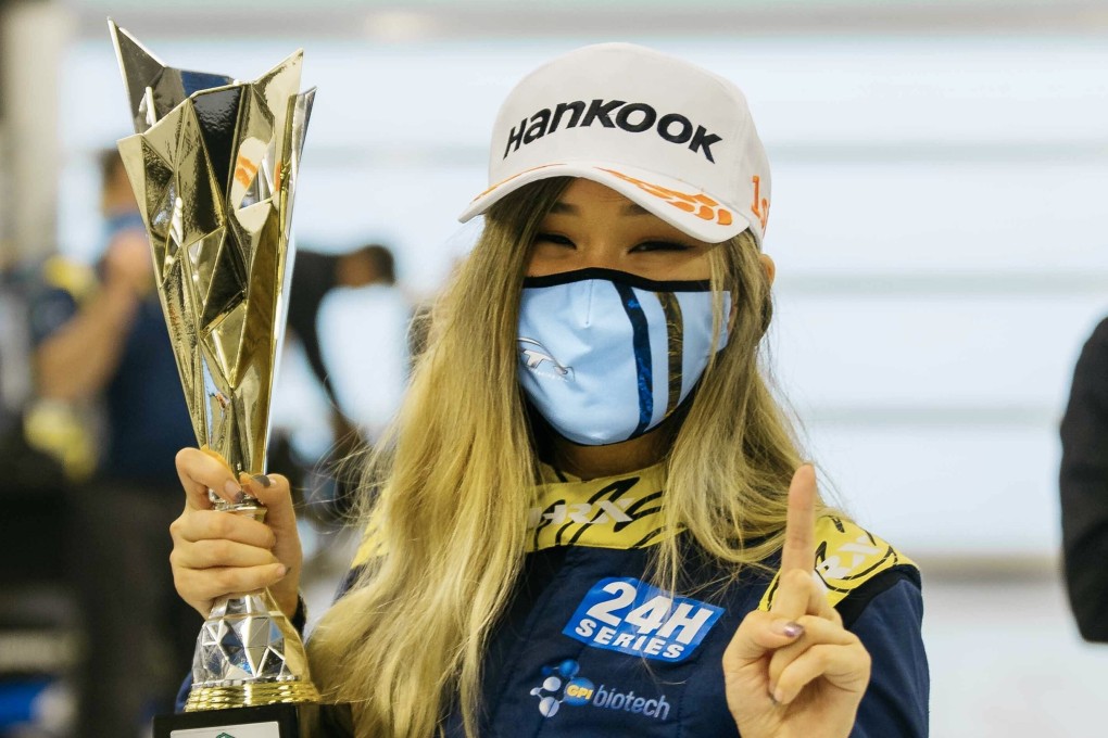 Samantha Tan celebrates with her Abu Dhabi 6 Hour Race trophy at Yas Marina Circuit, Abu Dhabi. Photos: Victor Chadarov