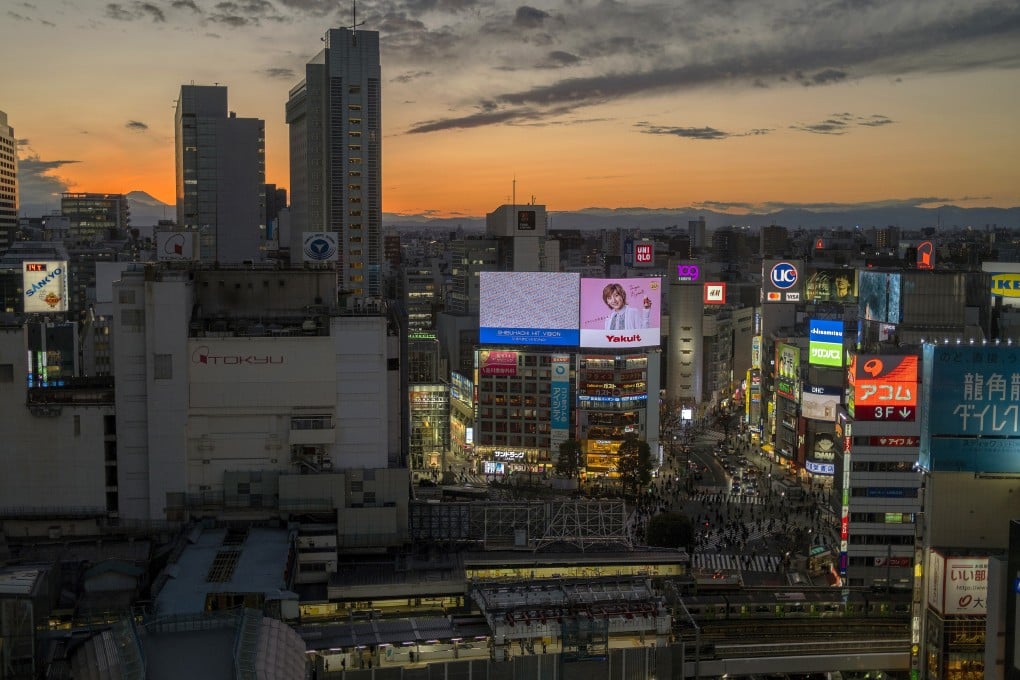 People walk across the Shibuya crossing in Tokyo on January 27. Photo: AP