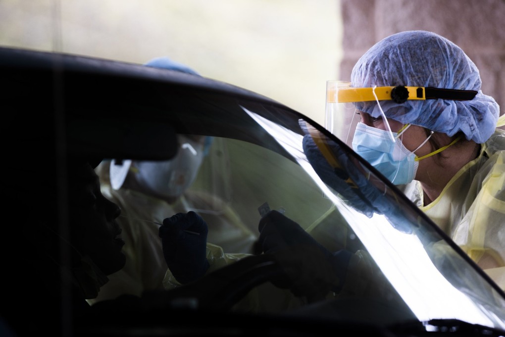 A nurse tests a patient for the coronavirus at a clinic in South Carolina. Photo: TNS