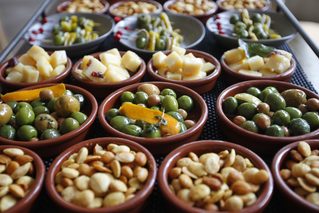 Sharing snacks is an important part of many cultures, say anthropologists. Tapas, dim sum and meze have caught on around the world. Photo: Getty Images