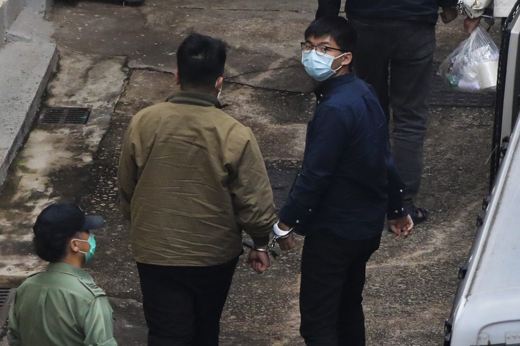 Joshua Wong (right) is detained at the Lai Chi Kok Reception Centre last November. Photo: Winson Wong