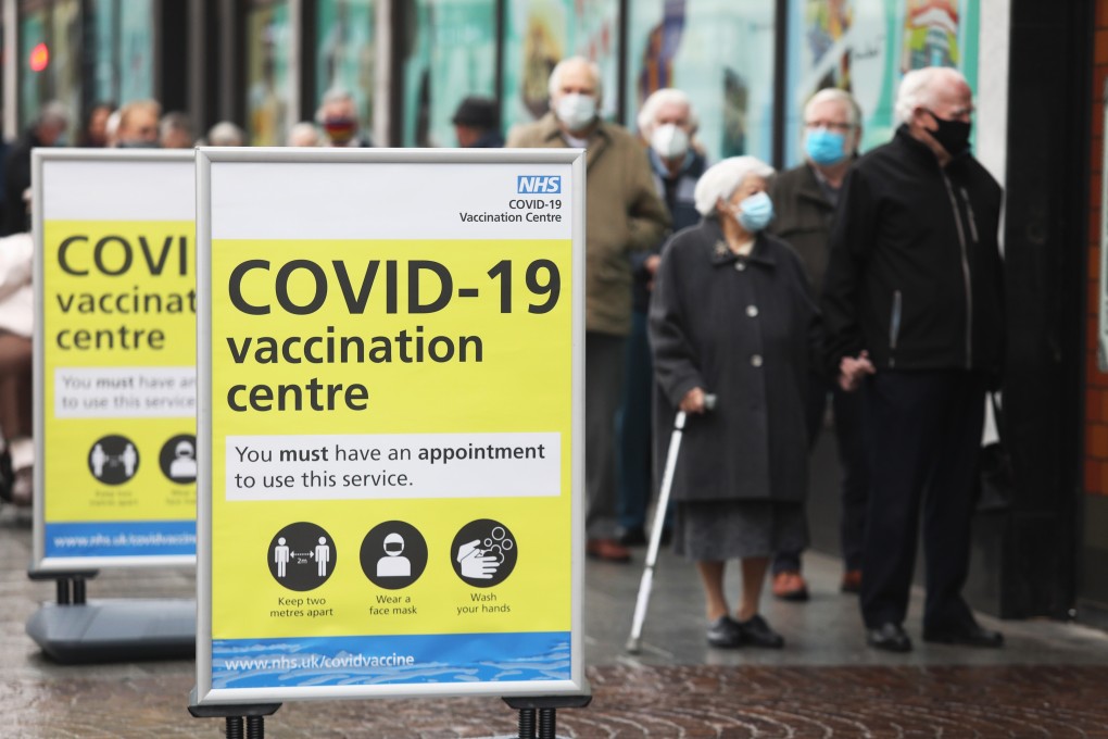 Visitors queue before receiving the AstraZeneca Covid-19 vaccine outside a department store in Folkestone, Britain. Photo: Bloomberg