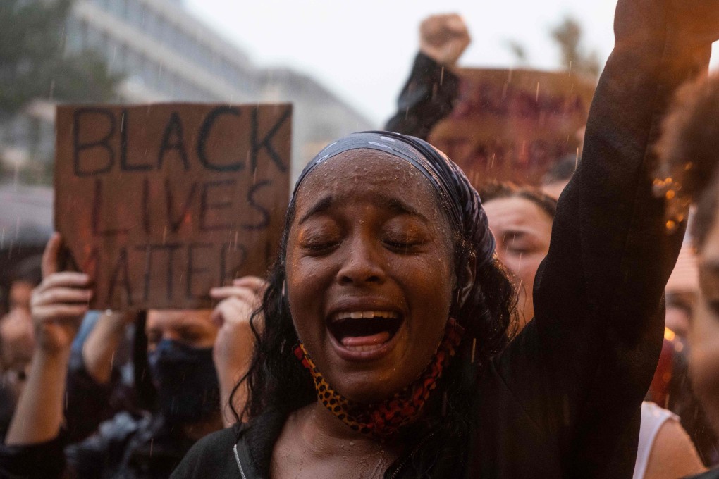 An activist at a Black Lives Matter protest at Lafayette Park in Washington in June. Photo: AFP