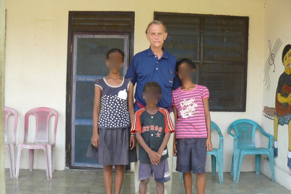 Father Richard Daschbach with children at the Topu Honis orphanage and women’s shelter, near Oecusse, East Timor, in 2009. Photo: Ian Lloyd Neubauer