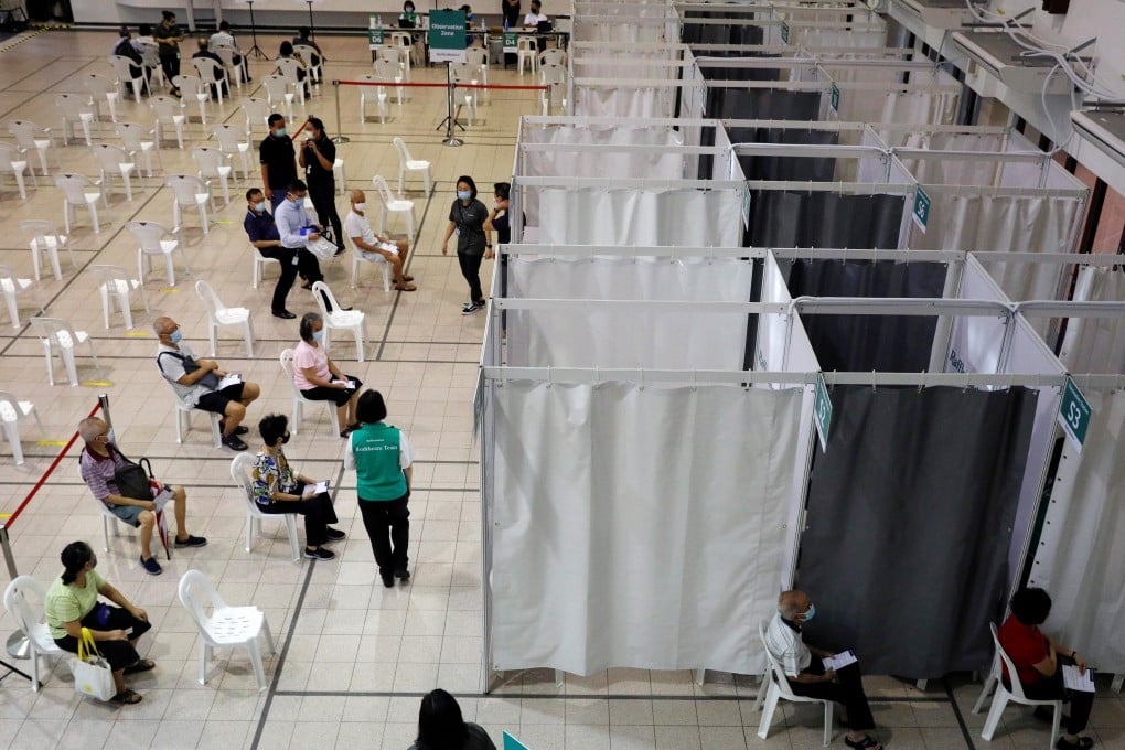 Singaporeans aged 70 years and above wait to get a dose of the Covid-19 vaccine on January 27. Photo: Reuters