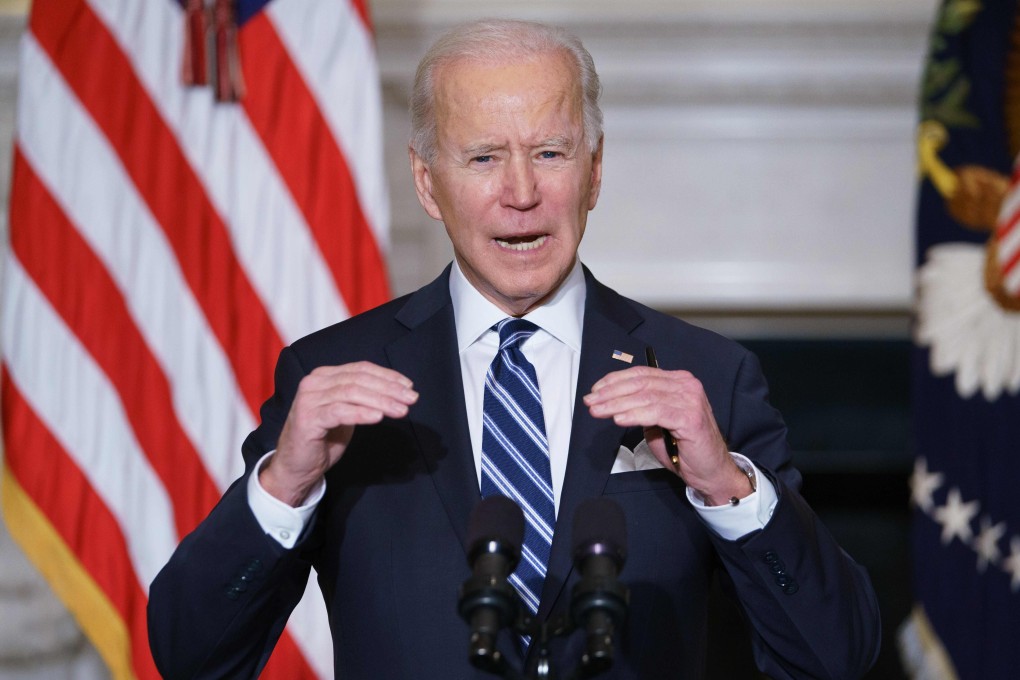US President Joe Biden speaks on climate change and job creation before signing executive orders in the State Dining Room of the White House on January 27. Photo: AFP
