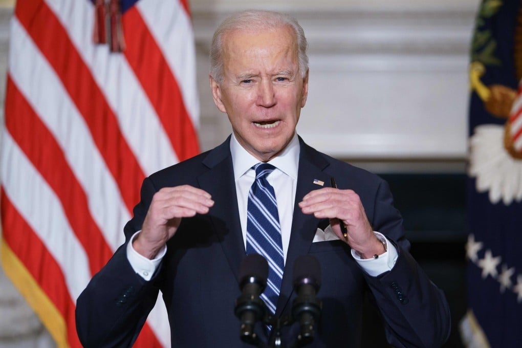 US President Joe Biden speaks on climate change and job creation before signing executive orders in the State Dining Room of the White House on January 27. Photo: AFP