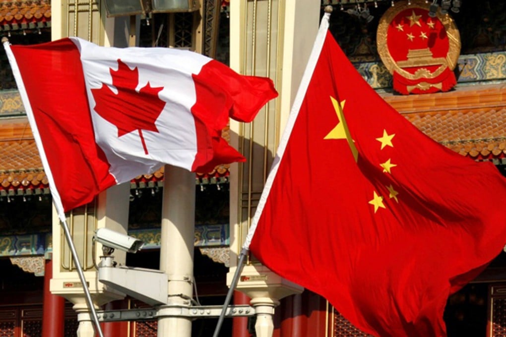 Canadian and Chinese flags. Photo: Reuters