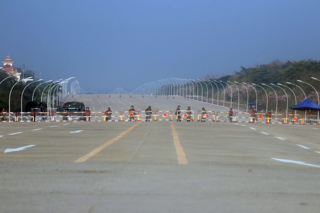Soldiers block the road heading to Myanmar’s parliament in Naypyidaw on Monday. Photo: EPA-EFE
