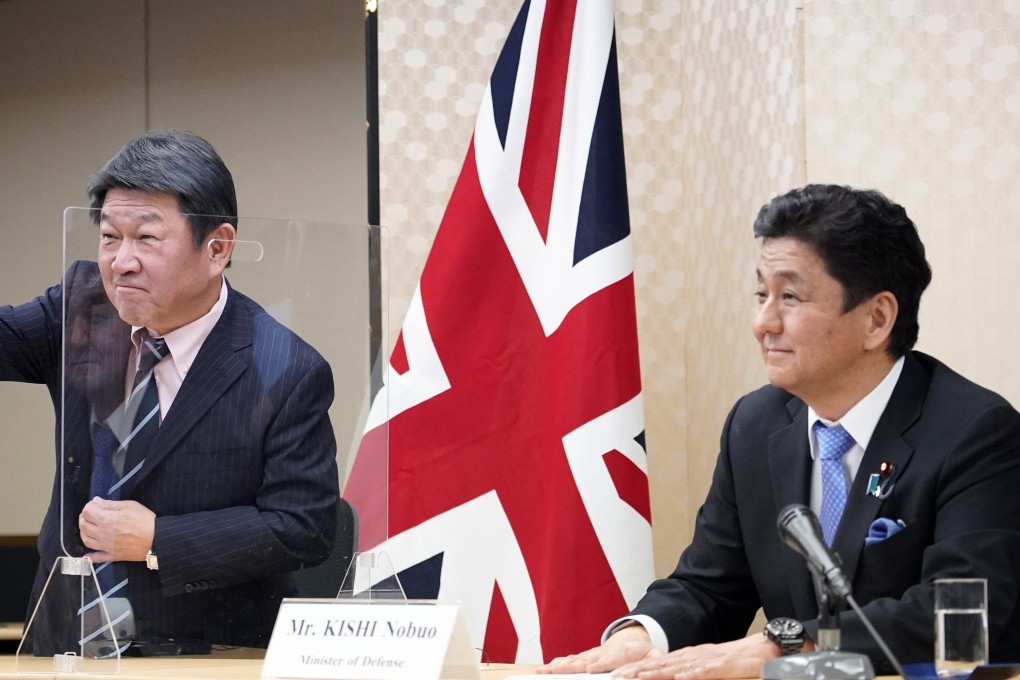 Japan’s Foreign Minister Toshimitsu Motegi, left, and Defence Minister Nobuo Kishi attend a video conference with their British counterparts on February 3 2021. Photo: AP