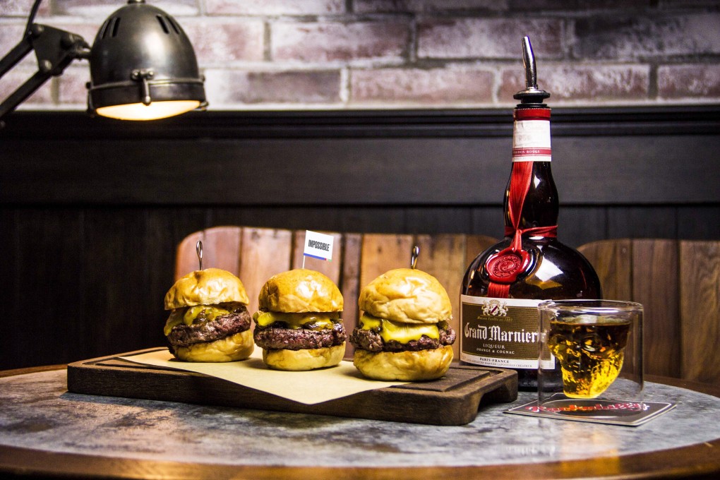 Impossible Burgers made from the company’s alternative meat patties. Photo: Handout