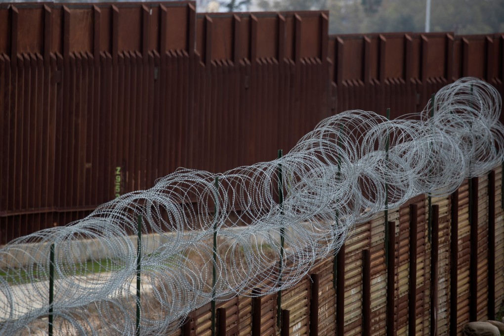 An old border wall fence next to the newly constructed wall along the US-Mexico border next to Tijuana, east of San Diego, California. Photo: Reuters