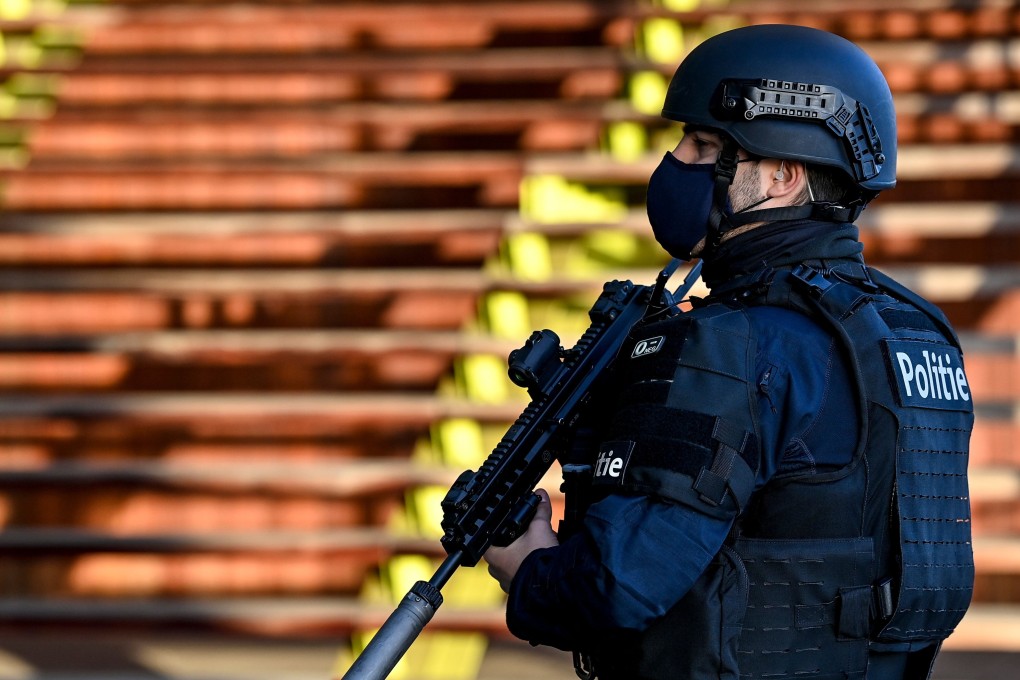 An armed officer stands outside the Antwerp courthouse during the trial of four persons, including an Iranian diplomat, on February 4, 2021. Photo: AFP