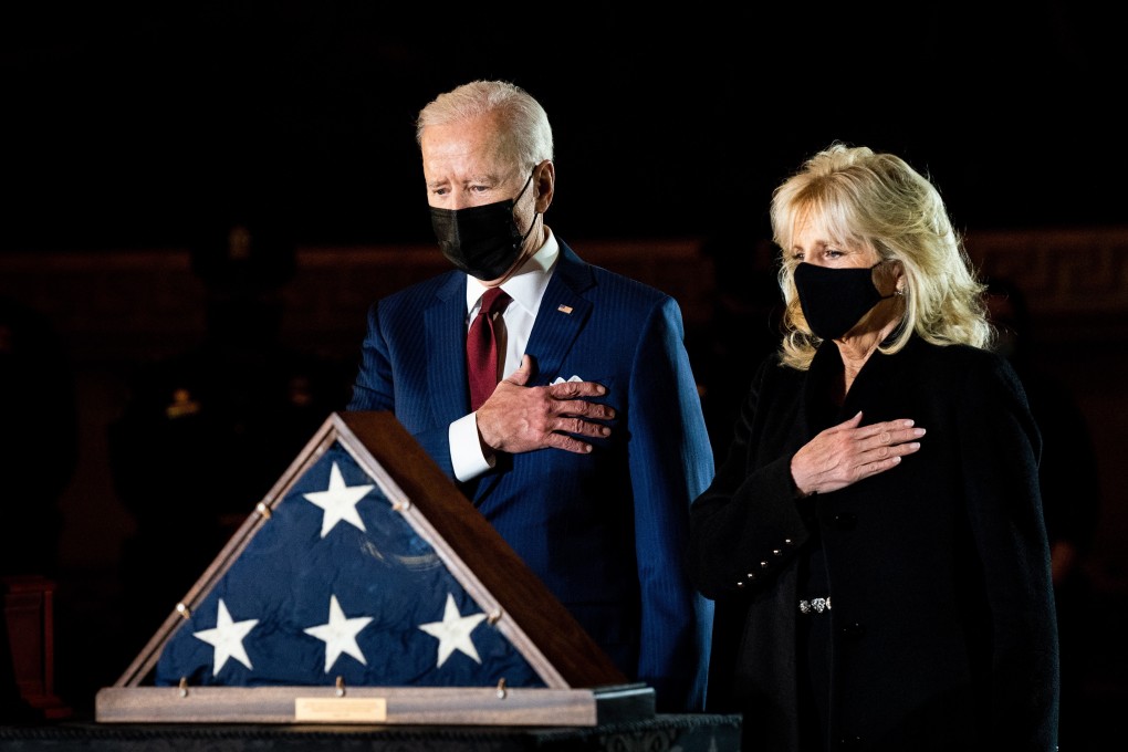 US President Joe Biden and First Lady Jill Biden pay their respects to the late Capitol Police Officer Brian Sicknick on Wednesday. Photo: EPA-EFE