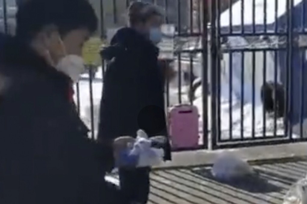 Police working this week at a community in Harbin, China, where a volunteer gatekeeper implementing coronavirus restrictions was stabbed by a neighbour he barred from leaving to dispose of trash. Photo: Weibo