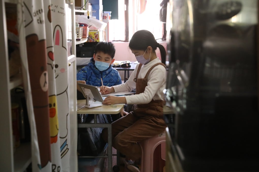 Children take part in online classes at their home in Tsuen Wan on January 18. Photo: K.Y. Cheng