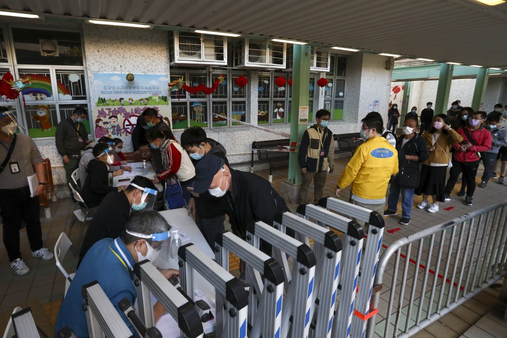 Residents of May Wah House in Chai Wan are released after the lockdown. Photo: Jonathan Wong
