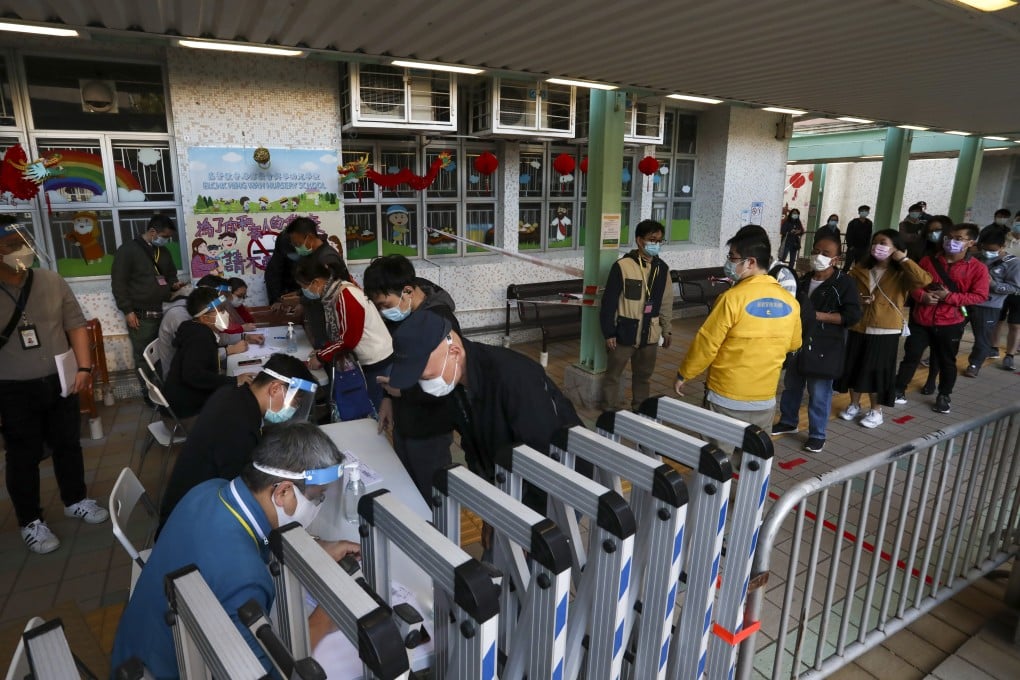 Residents of May Wah House in Chai Wan are released after the lockdown. Photo: Jonathan Wong