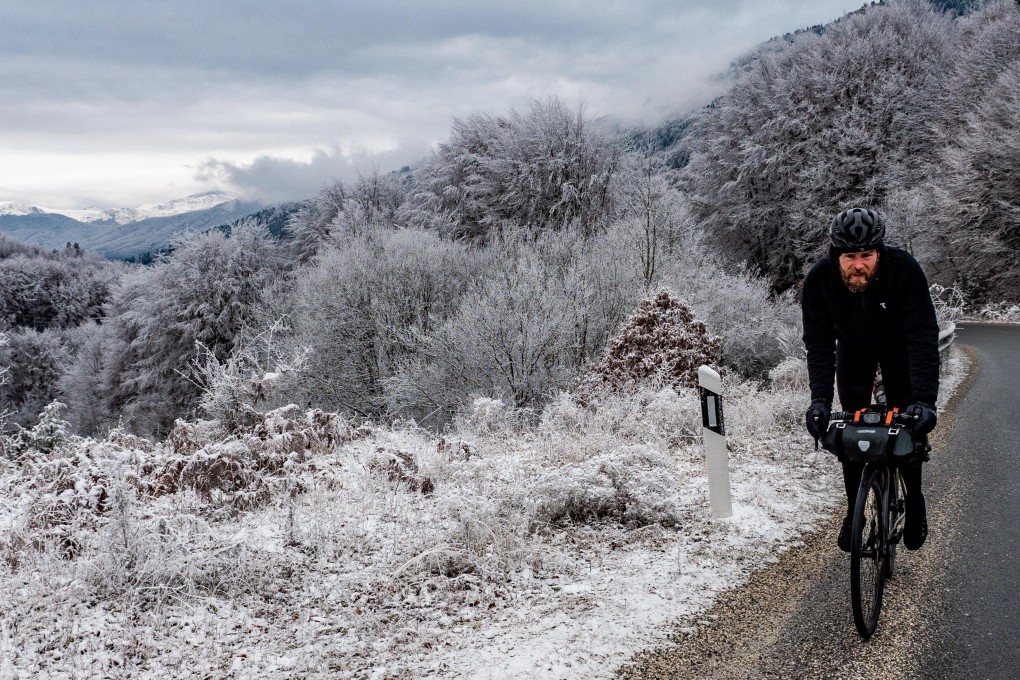 Jonas Deichmann cycling in Dubrovnik as he searches for a route around the world while avoiding border restrictions. Photo: Markus Weinberg