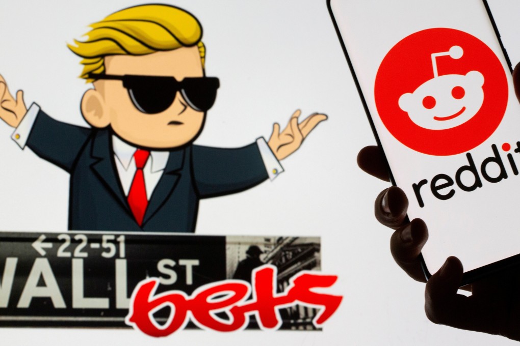 The Reddit logo is seen on a smartphone in front of a logo for WallStreetBets, a group it hosts. The price of GameStop shares shot up after the Reddit board, which has more than 2 million subscribers, hyped up the stock. Photo: Reuters