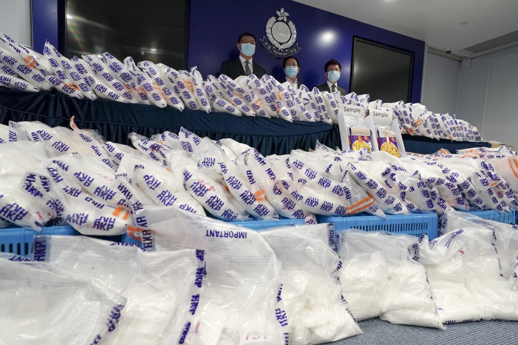 Officers from the Narcotics Bureau display ketamine confiscated in Hong Kong on Friday. Photo: SCMP
