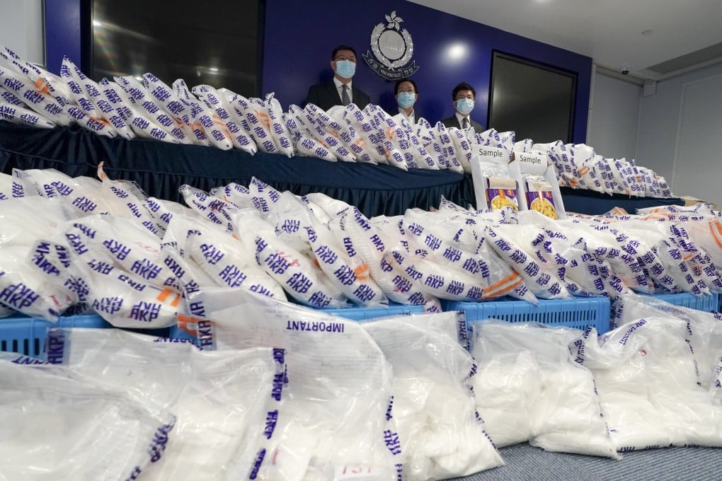 Officers from the Narcotics Bureau display ketamine confiscated in Hong Kong on Friday. Photo: SCMP