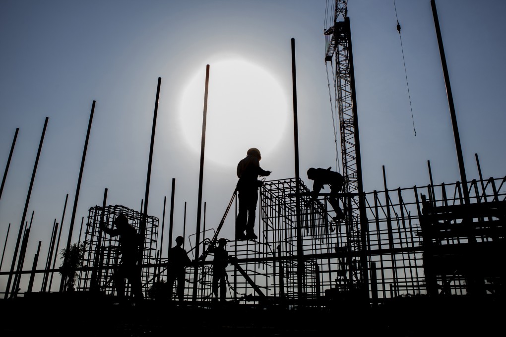 Construction workers at the Engro Powergen Thar coal power plant site in Pakistan in 2017, one of several energy projects China was helping the country to build as part of a US$55 billion economic partnership. Photo: Bloomberg