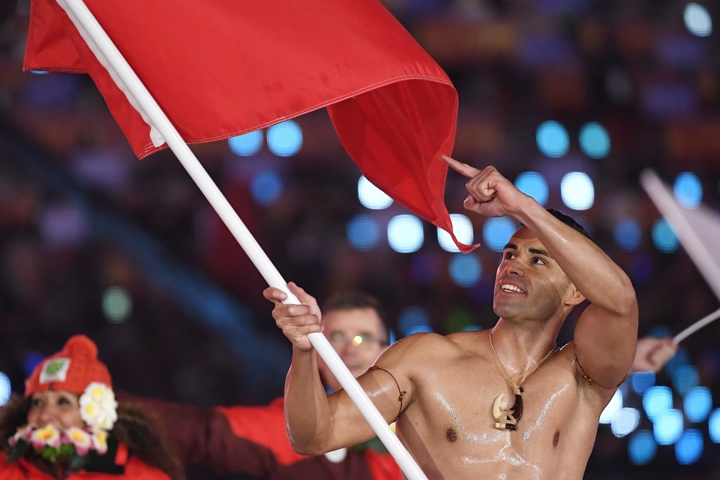 Team Tonga with flag bearer Pita Taufatofua arrive at the opening ceremony of the Pyeongchang 2018 Winter Olympic Games at the Olympic Stadium in South Korea. Photo: EPA