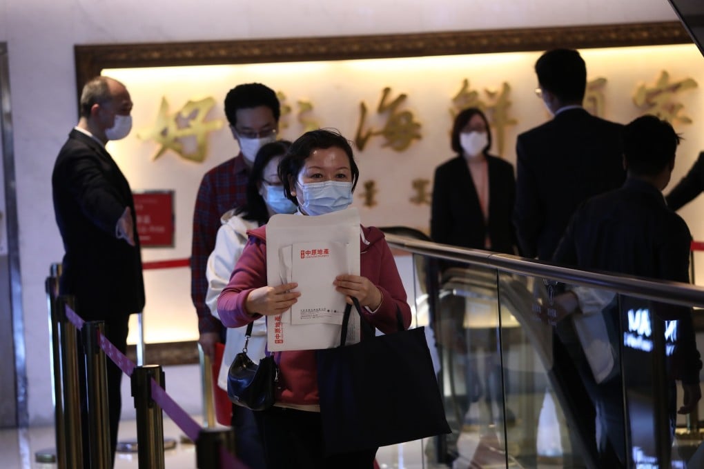 Prospective buyers at Sino Land’s sales centre in Tsim Sha Tsui on Monday. Photo: Jonathan Wong
