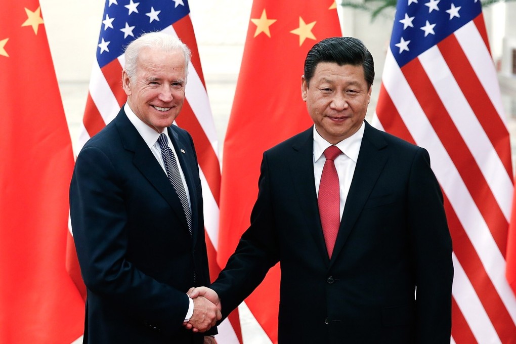 Chinese President Xi Jinping, right, and Joe Biden, then US vice-president in 2013, in Beijing. File photo: TNS