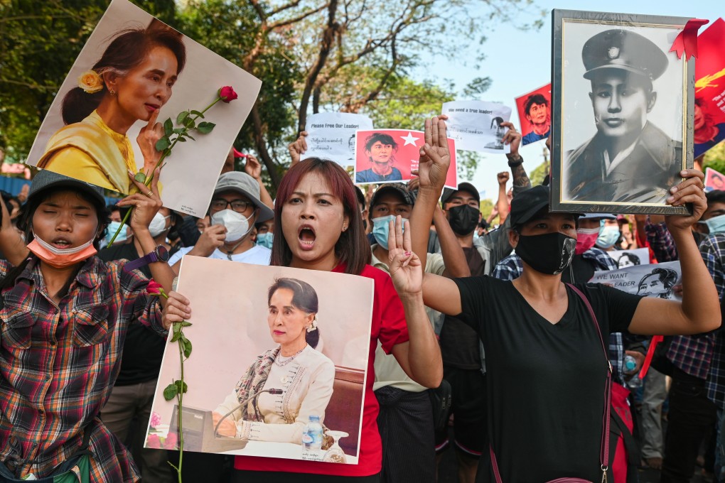 Protesters display the three-fingered salute as they rally against the military coup in Myanmar. Photo: Reuters