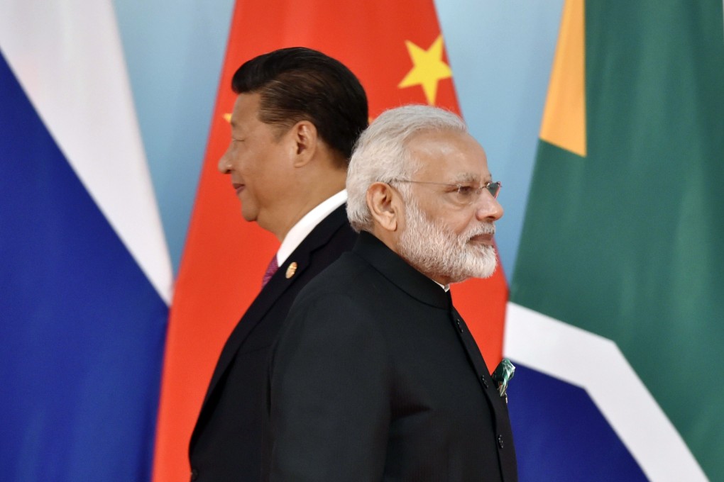 Chinese President Xi Jinping and Indian Prime Minister Narendra Modi may hold the key to moving forward from their countries’ border dispute. Photo: AFP