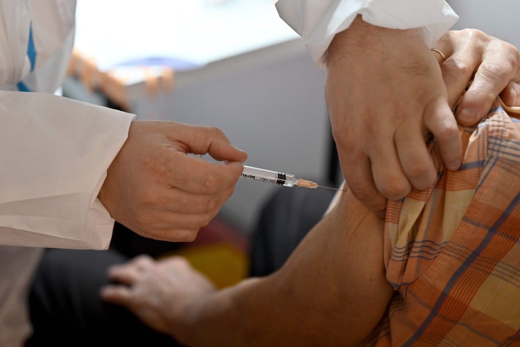 A man receives the Sinopharm Covid-19 vaccine in Belgrade on Thursday. Serbia inoculated more than 450,000 of its 7 million people in almost two weeks, a rate that exceeds all countries in Europe outside Britain, according to the scientific publication Our World in Data. Photo: AFP