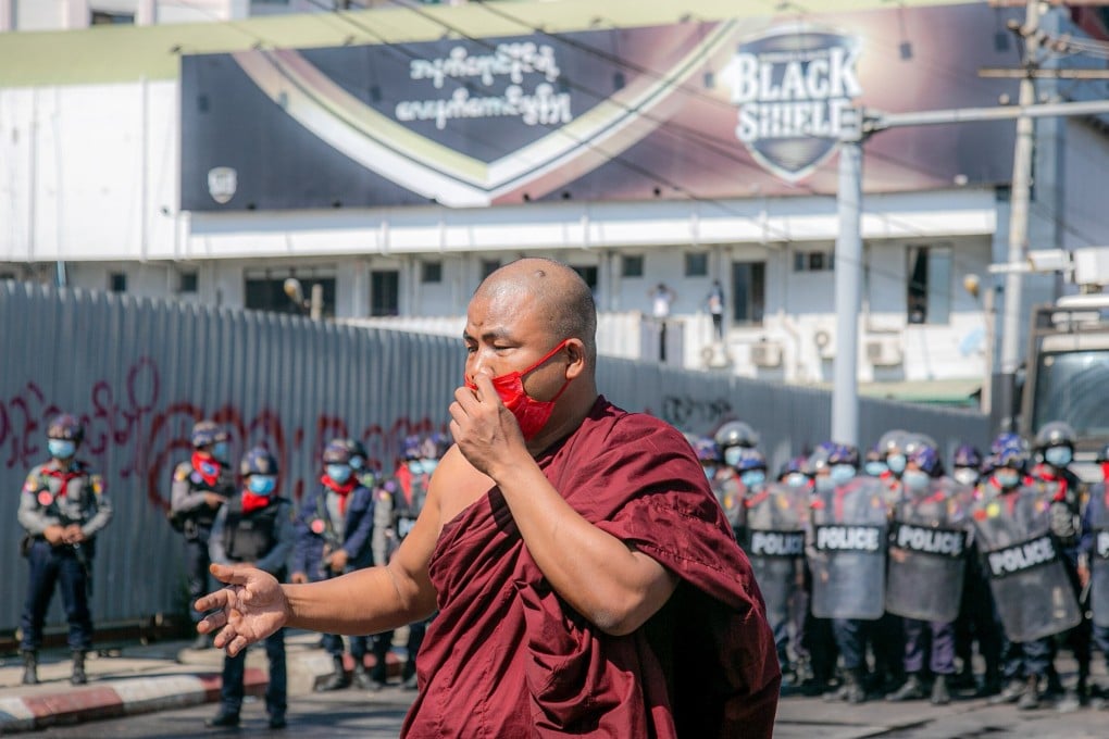 A monk takes part in a demonstration against the military coup. Photo: DPA