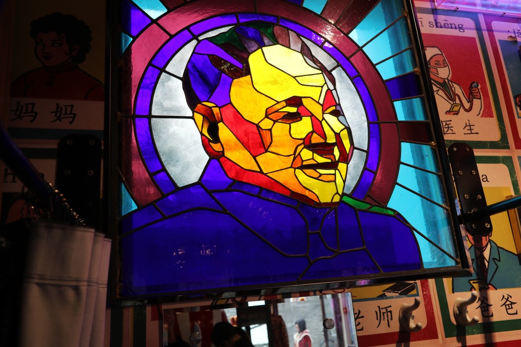 A stained glass window bears the image of late Chinese leader Deng Xiaoping at a shop at Nanluoguxiang, one of the oldest alleyways in Beijing, on December 17. Deng said in 1984 that “patriots governing Hong Kong” must underpin the “one country, two systems” principle after the city’s return to Chinese sovereignty. The catchphrase is gaining currency amid the currently politically fractured landscape. Photo: Simon Song
