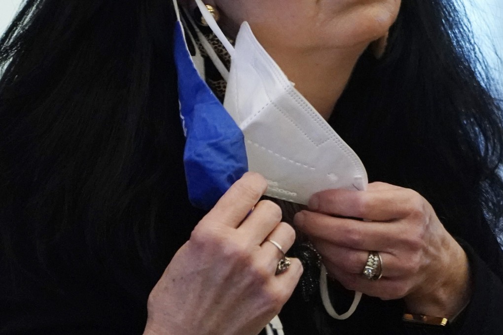 A US state lawmaker adjusts her face masks while asking a question at the Capitol in Jackson, Missouri, on February 4. Photo: AP