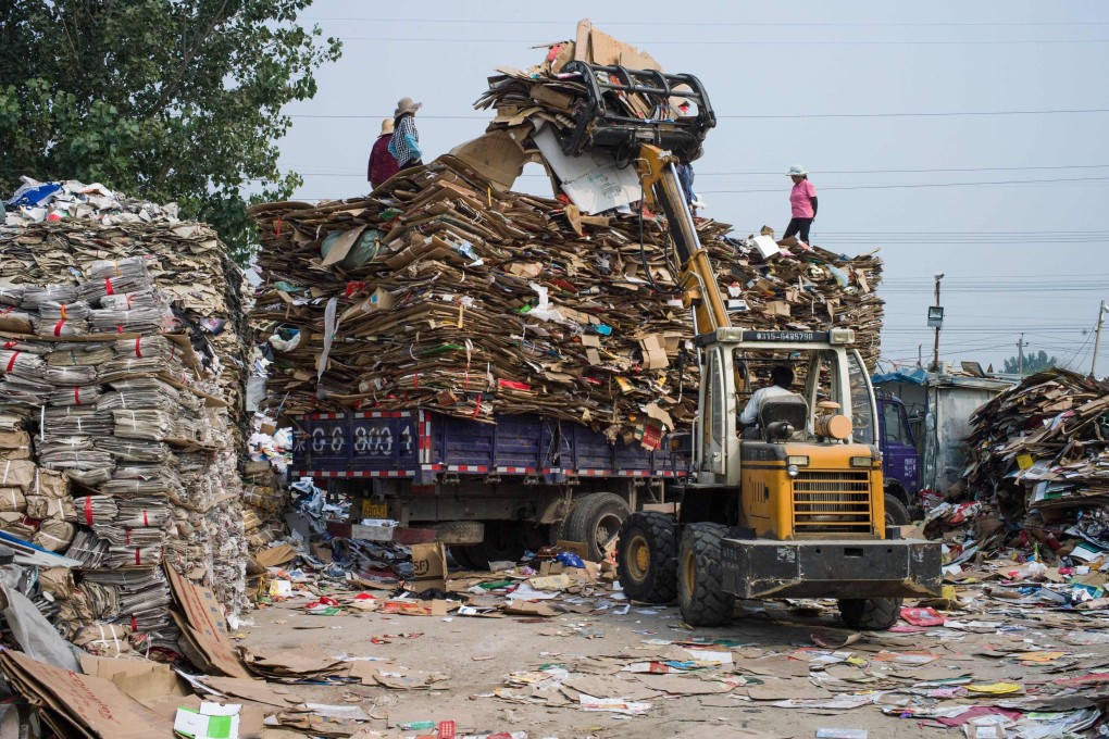China banned imports of waste paper from this year. Photo: AFP