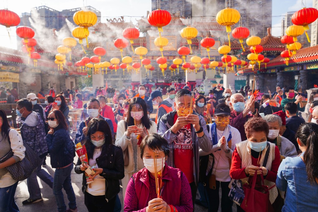 Worshippers make their first offerings of the Lunar New Year at Hong Kong’s Wong Tai Sin Temple on Friday. Photo: Sam Tsang