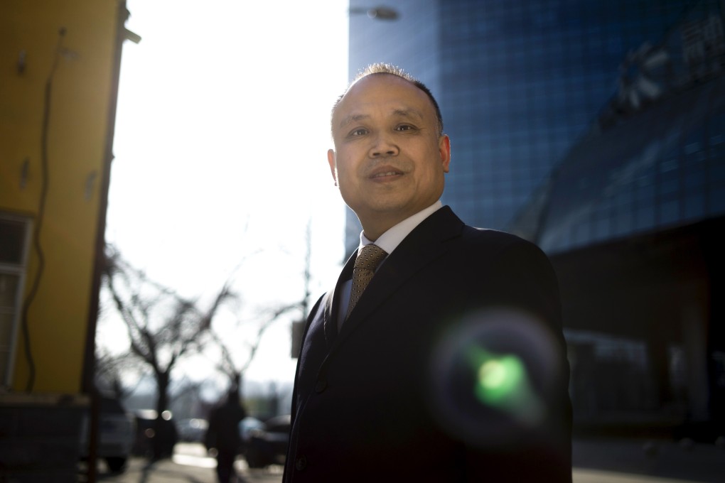 Chinese lawyer Yu Wensheng poses for a portrait in Beijing in 2017. Photo: AFP
